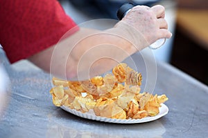 Homemade potato chips on a table