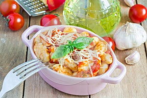Homemade potato gnocchi with tomato basil sauce
