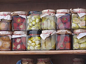 Homemade preserved eggplant, artichokes hearts and pepperoni in olive oil . Italian recipe