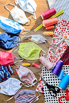 Homemade protection textil face, nose and mouth mask against virus . Sewing protective face masks at home during a covid-19