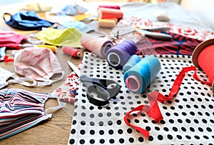 Homemade protection textil face, nose and mouth mask against virus . Sewing protective face masks at home during a covid-19