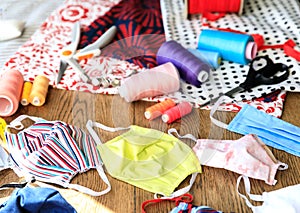 Homemade protection textil face, nose and mouth mask against virus . Sewing protective face masks at home during a covid-19