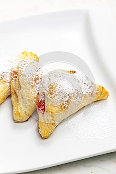 homemade puff pastry filled with strawberry jam