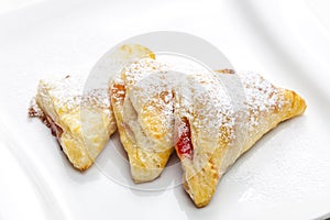 homemade puff pastry filled with strawberry jam