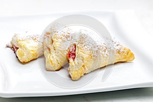 homemade puff pastry filled with strawberry jam