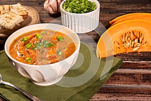 Homemade pumpkin cream, accompanied by spices. pumpkin broth photo