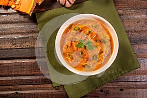 Homemade pumpkin cream, accompanied by spices. pumpkin broth photo