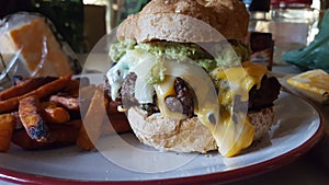 Homemade quacamole burger on gluten free bun