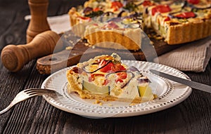 Homemade quiche with vegetables and cheese, vegetarian food.