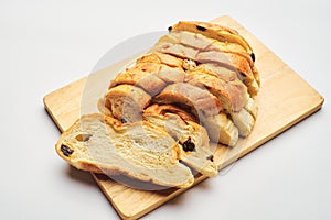 Slices of raisin bread closeup  in white background