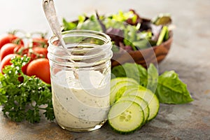 Homemade ranch dressing in a mason jar photo