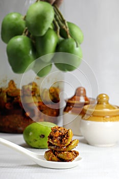 Homemade raw mango pickle prepared in India during summer season