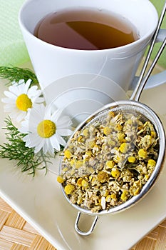 Homemade remedy - herbal camomile tea matricaria chamomilla -