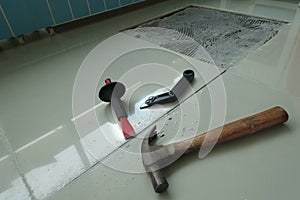 Homemade Replacing floor tiles in home.