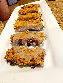 Homemade rice crispy and peanut butter bar with  chocolate