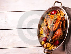 Homemade Roasted Thanksgiving Day Turkey on white wooden background.