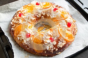 Homemade `Roscon de reyes` , Spanish typical dessert of Epiphany photo