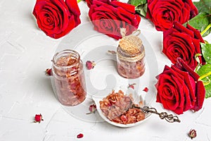 Homemade rose petals jam in bowl and glass jar