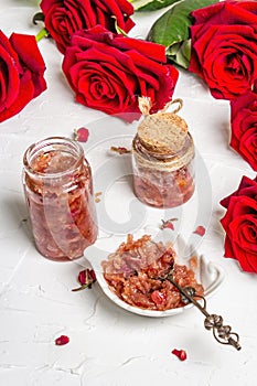 Homemade rose petals jam in bowl and glass jar