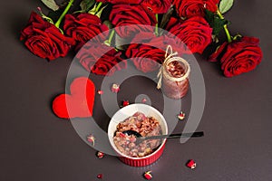 Homemade rose petals jam in bowl and glass jar