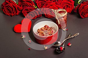 Homemade rose petals jam in bowl and glass jar