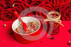 Homemade rose petals jam in bowl and glass jar