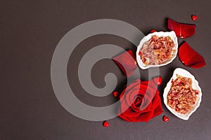 Homemade rose petals jam in bowl and glass jar