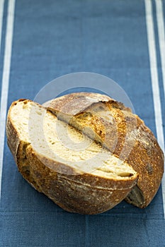Homemade round loaf of freshly baked artisan sourdough bread