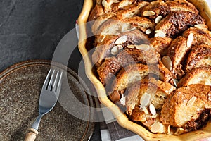 Homemade rustic bread pudding with chocolate and almonds