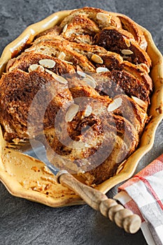 Homemade rustic bread pudding with chocolate and almonds