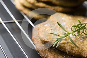 Homemade rustical crackers with rosemary photo