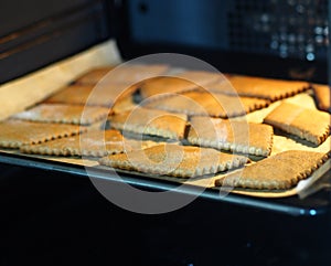 Homemade rye flour cookies on a baking sheet