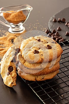 Homemade salted caramel chocolate chips cookies. Dark background