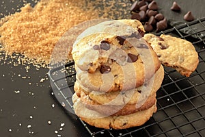 Homemade salted caramel chocolate chips cookies. Dark background