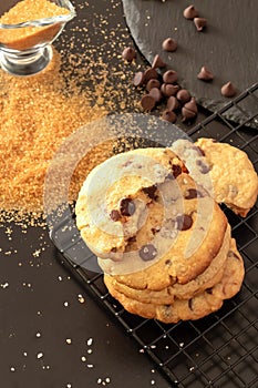 Homemade salted caramel chocolate chips cookies. Dark background