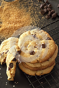 Homemade salted caramel chocolate chips cookies. Dark background