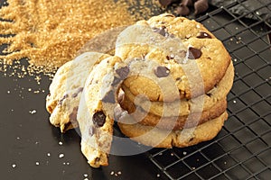 Homemade salted caramel chocolate chips cookies. Dark background