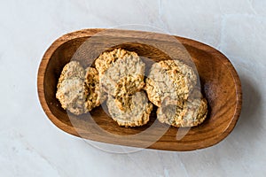 Homemade Salty Yogurt Cookies with Rolled Oats / Salted Pastries in Wooden Bowl.