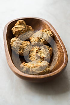 Homemade Salty Yogurt Cookies with Rolled Oats / Salted Pastries in Wooden Bowl