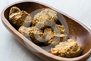 Homemade Salty Yogurt Cookies with Rolled Oats / Salted Pastries in Wooden Bowl