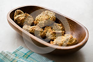 Homemade Salty Yogurt Cookies with Rolled Oats / Salted Pastries in Wooden Bowl
