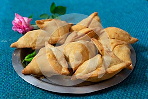 Homemade Samosa, smosa. A vegetarian spicy Indian special traditional street food. Iftaari dish, Selective focus photo