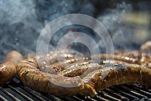 Homemade sausages on barbeque