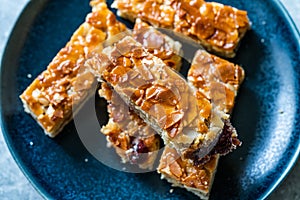 Homemade Scandinavian Dessert Swedish Tosca Cake with Almond Slices / Toscakaka. Top View