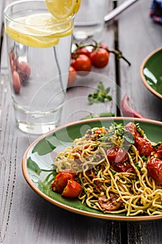 Homemade semolina spaghetti with cherry