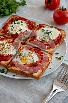 Homemade Sheet-Pan Shakshuka Toast on a Plate, side view