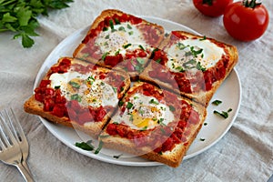 Homemade Sheet-Pan Shakshuka Toast on a Plate, side view