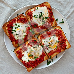 Homemade Sheet-Pan Shakshuka Toast on a Plate, top view. Close-up