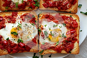 Homemade Sheet-Pan Shakshuka Toast on a Plate, top view. Close-up