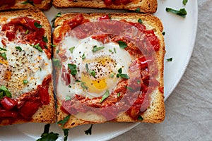 Homemade Sheet-Pan Shakshuka Toast on a Plate, top view. Close-up